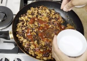 add sugar, spicy tomato sauce