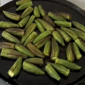 Stuffed okra well cooked and turning brownish